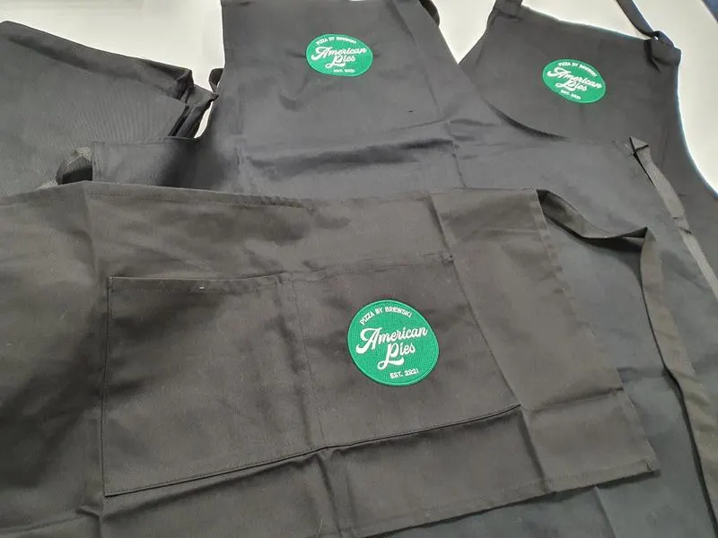 Premium embroidered workwear jackets with company logos from BPM Print Manchester